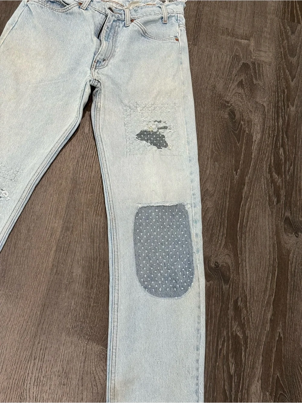 Vintage orange tab Y2K Light Blue Distressed Men’s Jeans with Patch Detail